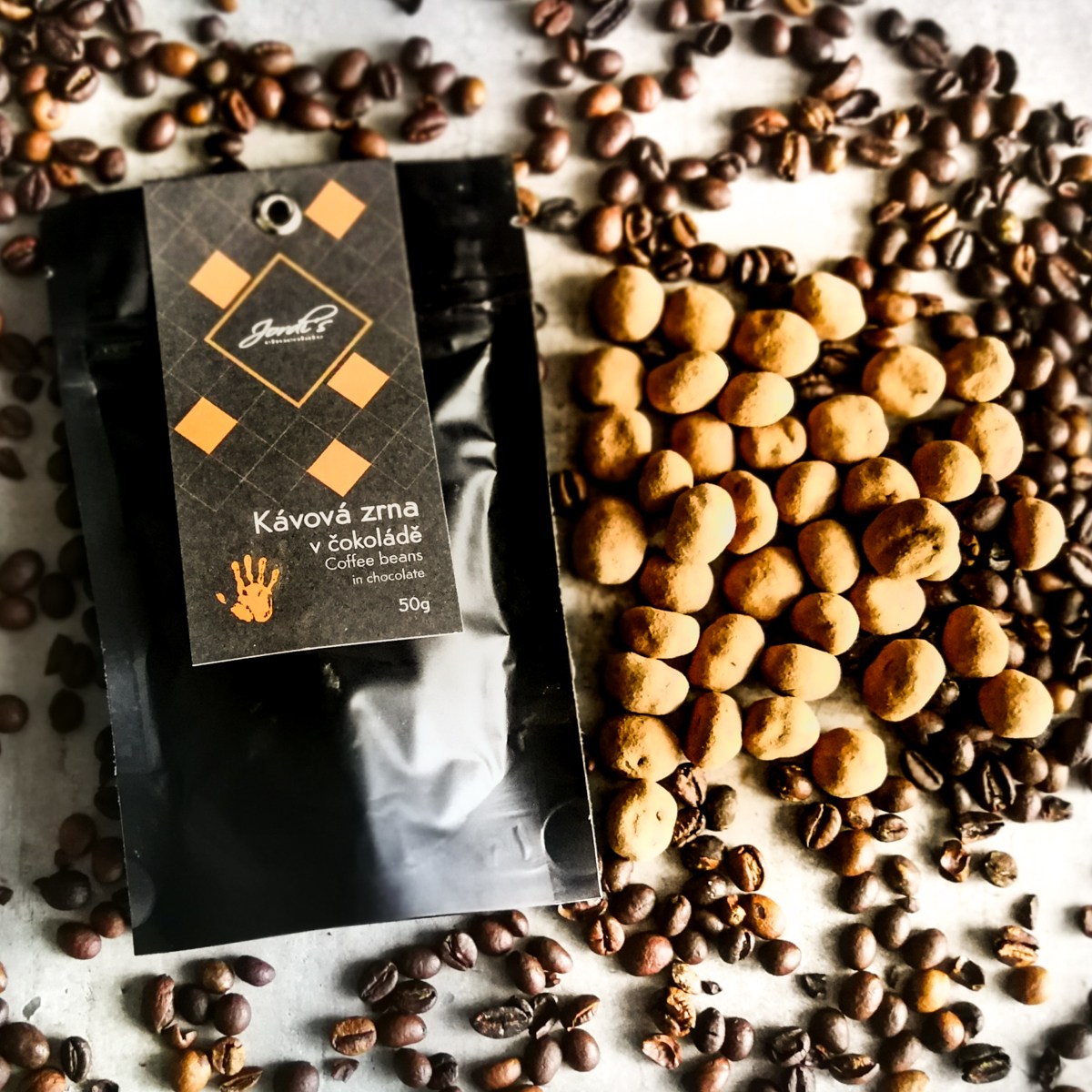 Kávová zrna v čokoládě 63% 50g